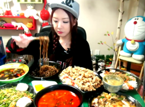 This South Korean Girl is Making Over $100,000 A Year Eating With Her Camera